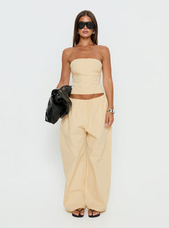 front view of model wearing Princess Polly Tidekiss Pants Lemontini Mid Rise Pants 