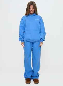 front view of model wearing Princess Polly Princess Polly Wide Leg Track Pant Bubble Text Blue High Rise Pants Pants 