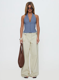 side view of model wearing Princess Polly Paltrow Mid Rise Wide Leg Cargo Jeans Cream Petite Low Rise Jeans 