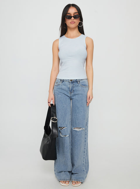 front view of model wearing Princess Polly Kadison Low Rise Straight Leg Jeans Mid Wash Blue Low Rise Jeans 