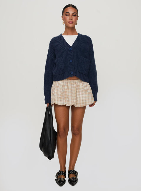 front view of model wearing Princess Polly Osias Cable Knit Cardigan Navy Cropped Jumpers 