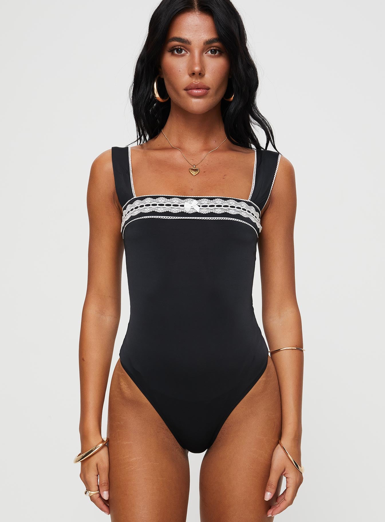 front view of model wearing Princess Polly Keating Bodysuit Black Sleeveless 
