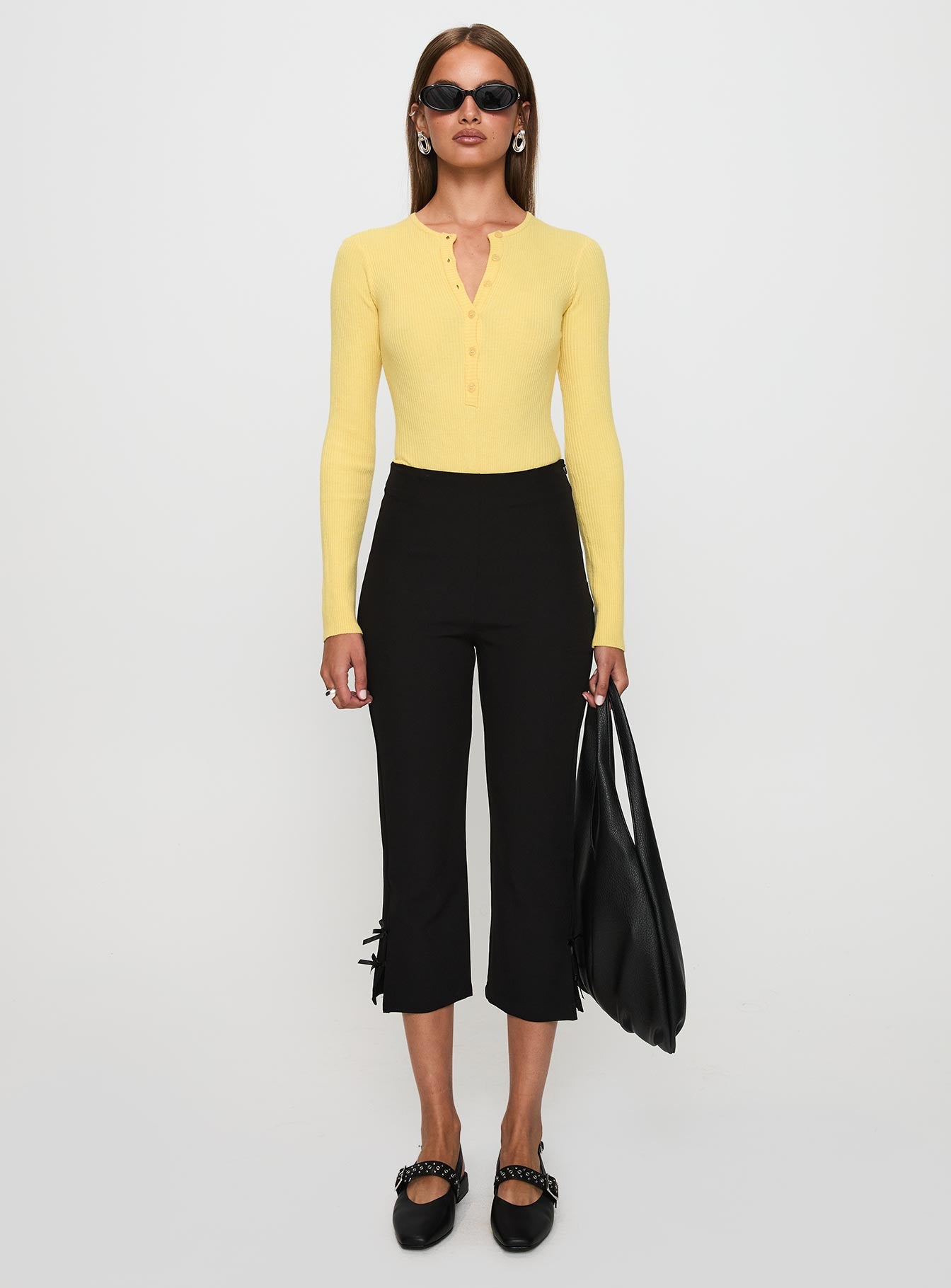 front view of model wearing Princess Polly Kerra Long Sleeve Bodysuit Lemon Full Sleeves 