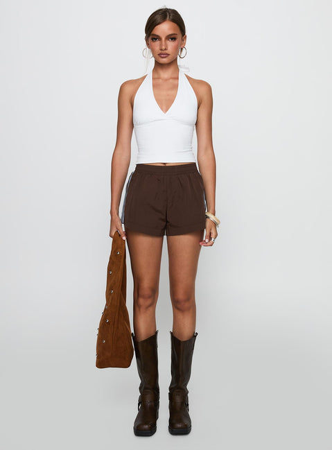 front view of model wearing Princess Polly Borderline Track Short Brown / Blue High Waisted Shorts 