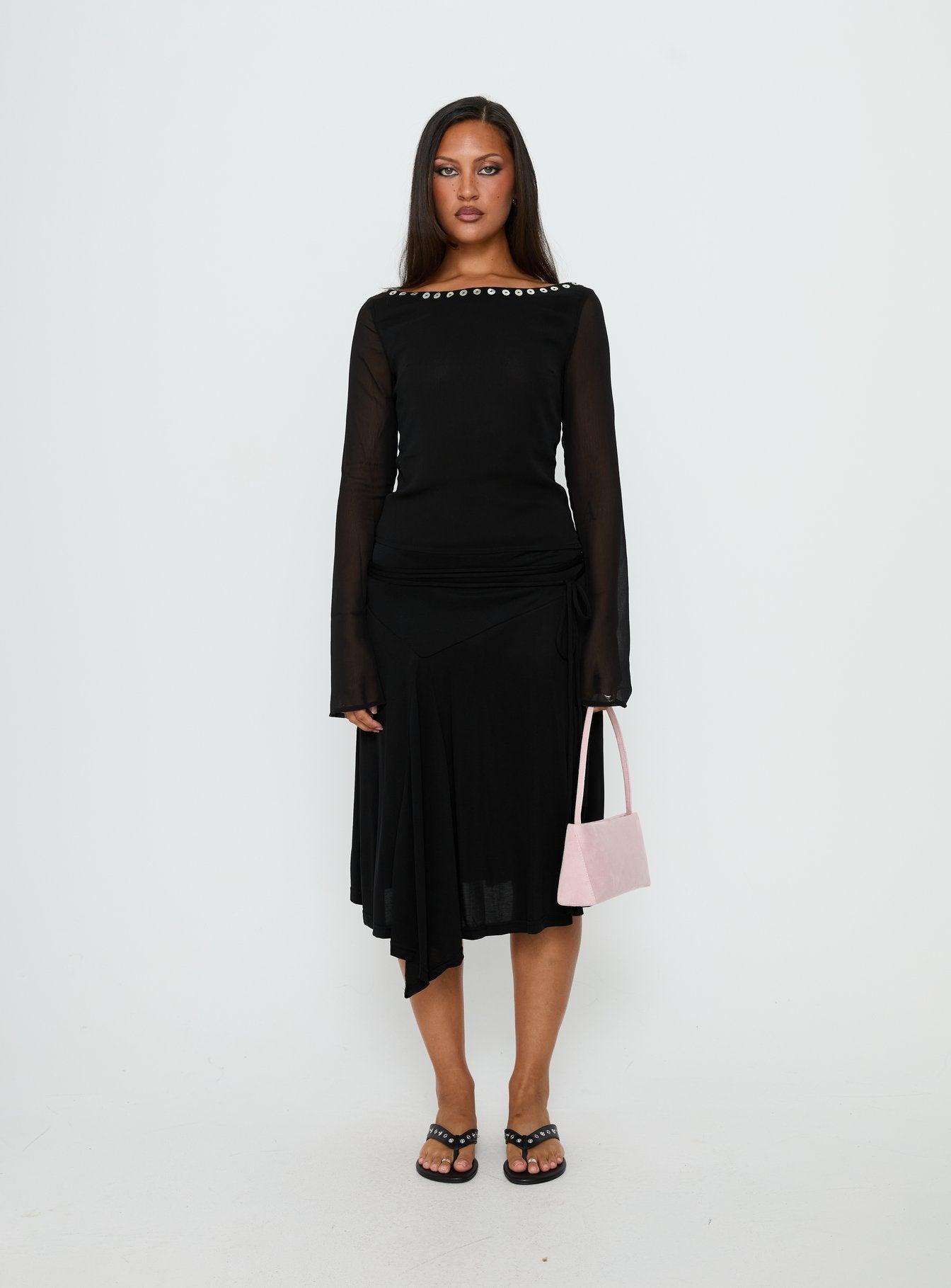   side view of model wearing Princess Polly Joaney Tie Side Jersey Midi Skirt Black Midi Skirts 