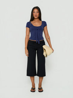 Crafted from Kallora Low Rise Wide Leg Capris Black womens-regular-pants detail view of model wearing Princess Polly