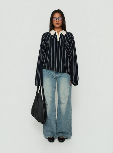 Featuring the Boarders V Neck Polo Jumper Navy Stripe womens-jumpers in short length with oversized fit front view of model wearing Princess Polly