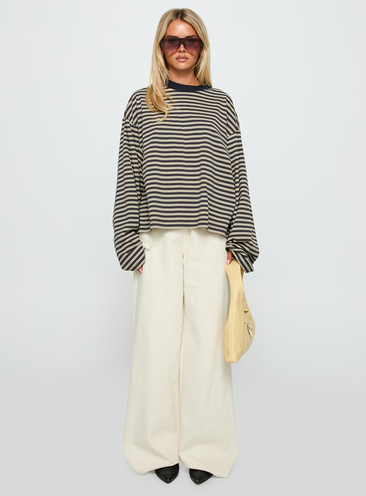 front view of model wearing Princess Polly Bloom Long Sleeve Top Beige Stripe Full Sleeves Crew Neck 