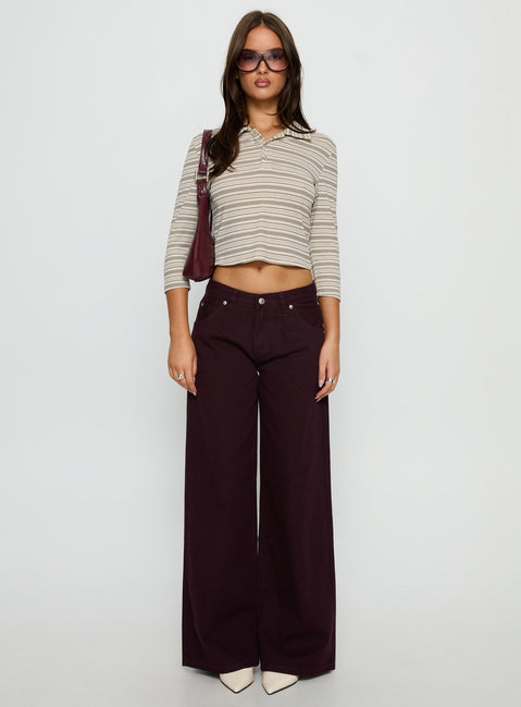 front view of model wearing Princess Polly Supercut Low Rise Baggy Pleat Jeans Currant Mid Rise Jeans 