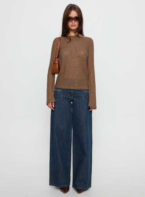 front view of model wearing Princess Polly Unwritten Mid Rise Wide Leg Jeans Dark Blue Wash Mid Rise Jeans 