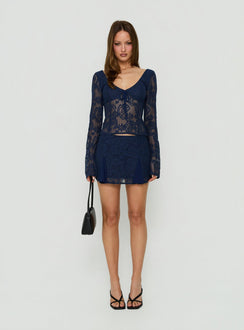 Discover the Quani Lace Mini Skirt Navy womens-skirts with fitted aline design and floral lace hemPrincess Polly