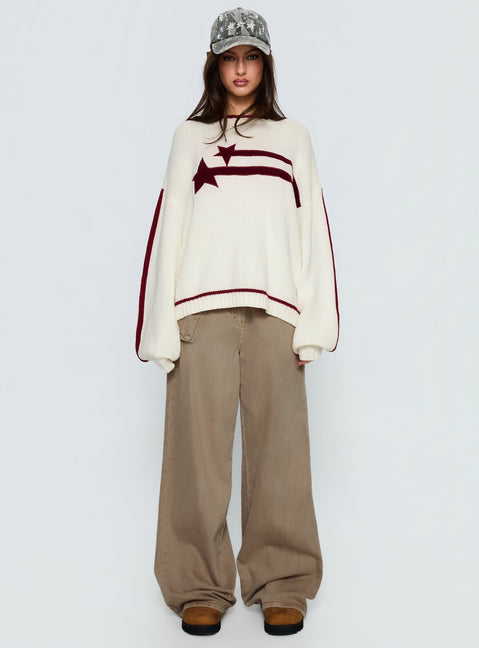 front view of model wearing Princess Polly Star Track Graphic Jumper Cream / Red Longline Jumpers 