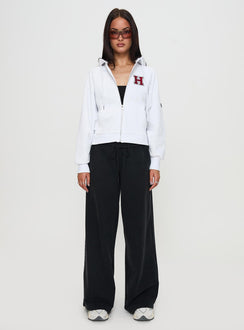 front view of model wearing Princess Polly Harvard Raglan Zip Up White / Red Jumpers 
