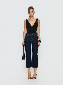 front view of model wearing Princess Polly Cindee High Rise Cropped Jeans Raw Indigo High Rise Jeans 