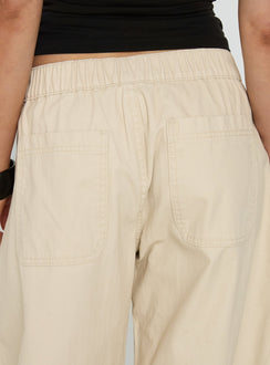 back view of model wearing Princess Polly Selective Memory Low Rise Wide Leg Cargo Pants Cream Low Rise Pants 