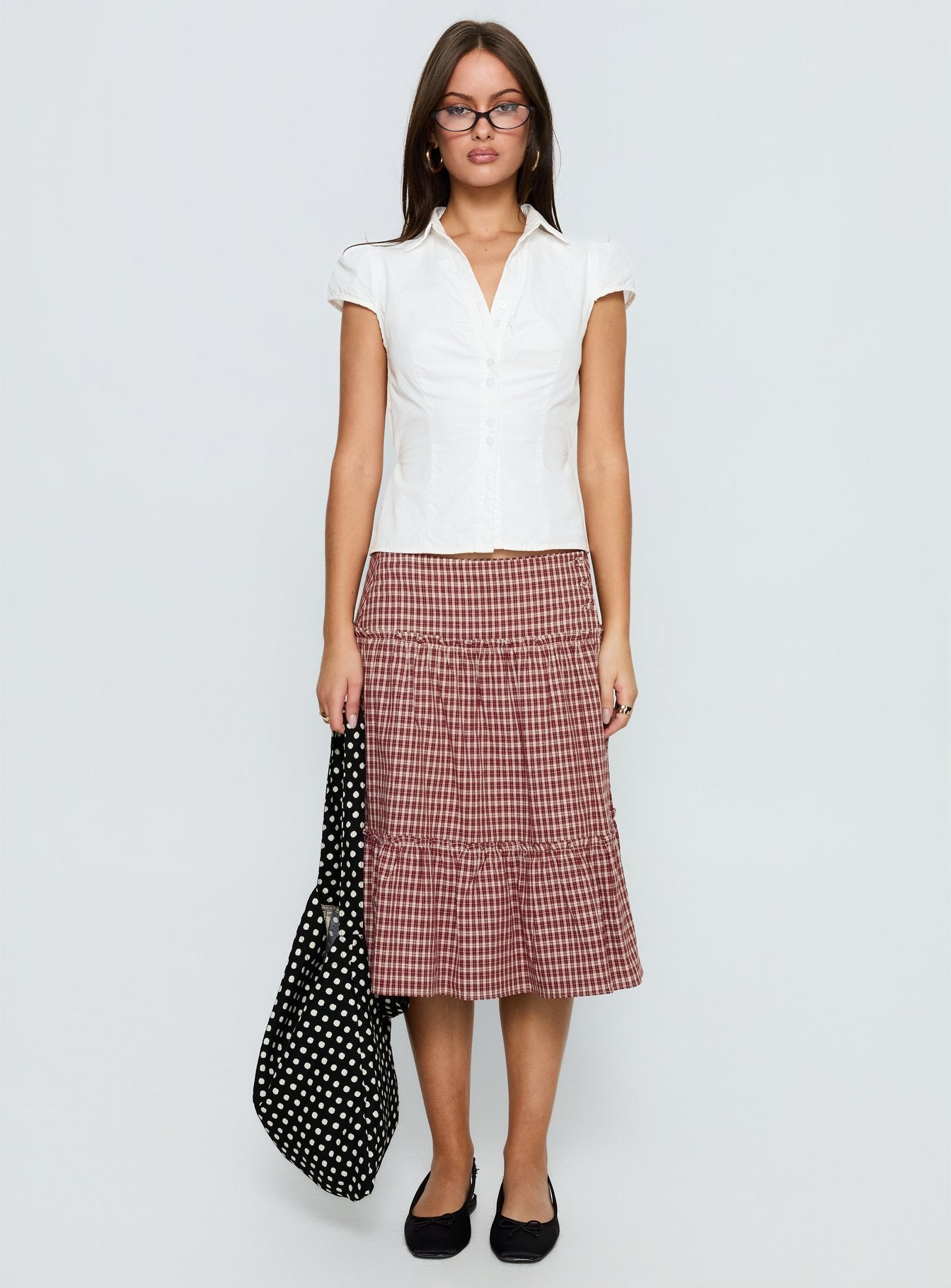   front view of model wearing Princess Polly Cascades Low Rise Midi Skirt Red Check Midi Skirts 