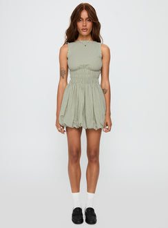 back view of model wearing Princess Polly Vittoria Bubble Hem Mini Dress Sage High Neck 