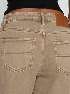 side view of model wearing Princess Polly Naylor Mid Rise Wide Leg Jeans Light Brown Wash Mid Rise Jeans 