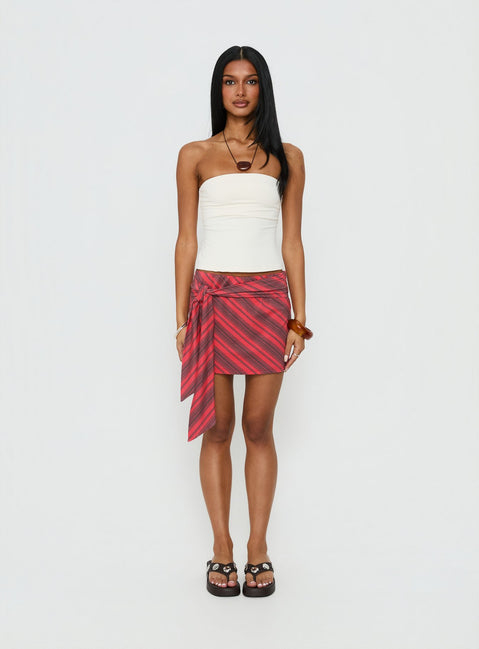   front view of model wearing Princess Polly Lindsy Tie Side Mini Skirt Red Multi Mini Skirts 