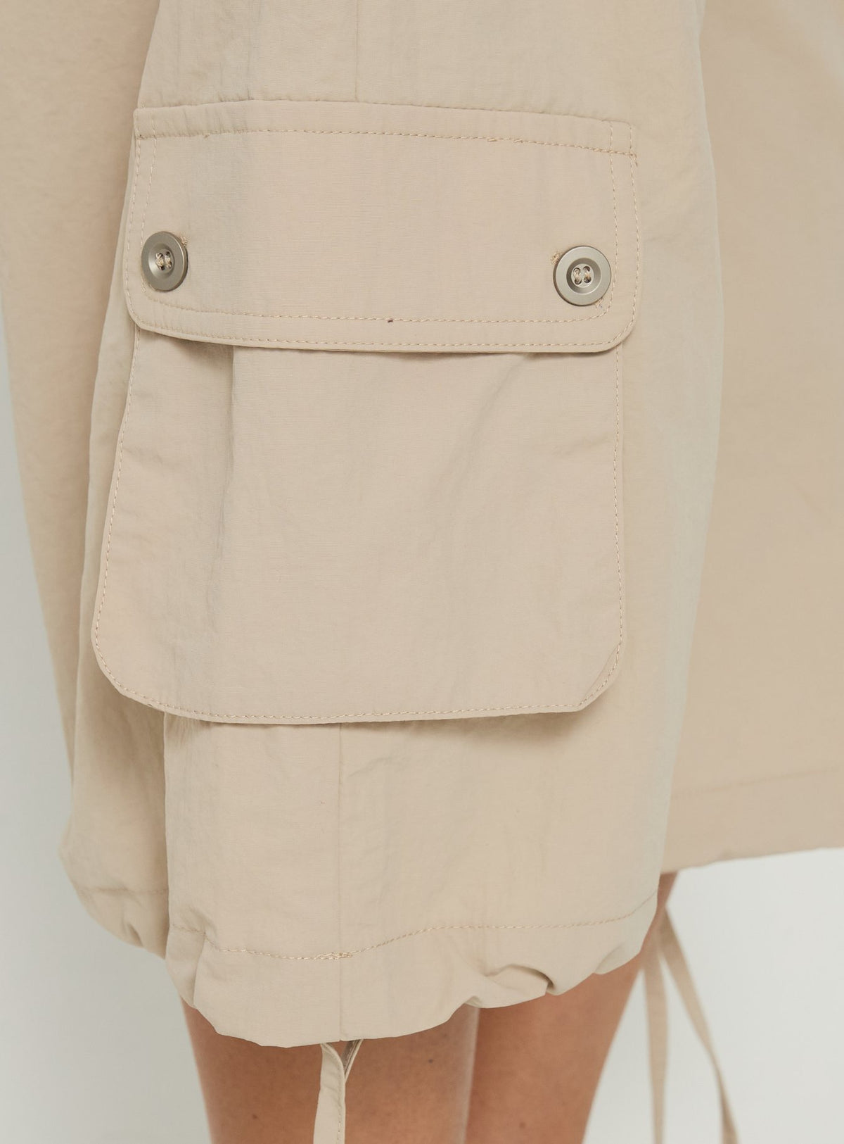 Highlighting the Relaxer 3/4 Cargo Pants Beige in womens regular pants with mid-rise waistband detail Princess Polly