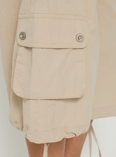 Highlighting the Relaxer 3/4 Cargo Pants Beige in womens regular pants with mid-rise waistband detail Princess Polly