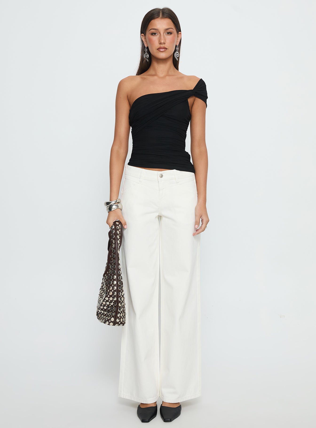 front view of model wearing Princess Polly Catiana Low Rise Wide Leg Jeans White Low Rise Jeans 