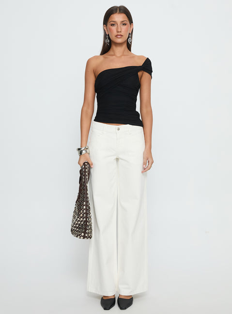 front view of model wearing Princess Polly Catiana Low Rise Wide Leg Jeans White Low Rise Jeans 
