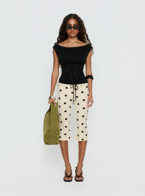 front view of model wearing Princess Polly Samaira Capri Pant Cream Polka Dot Mid Rise Pants 