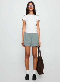front view of model wearing Princess Polly Fealure Shorts Green High Waisted Shorts 