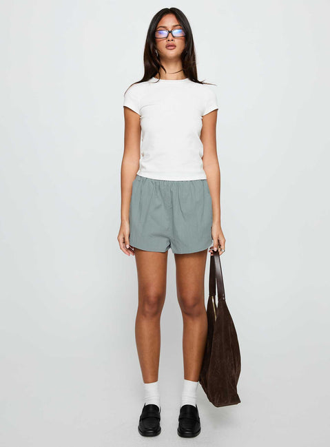 front view of model wearing Princess Polly Fealure Shorts Green High Waisted Shorts 