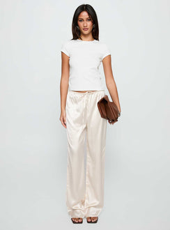 front view of model wearing Princess Polly Soulstar Satin Pants Champagne Low Rise Pants 