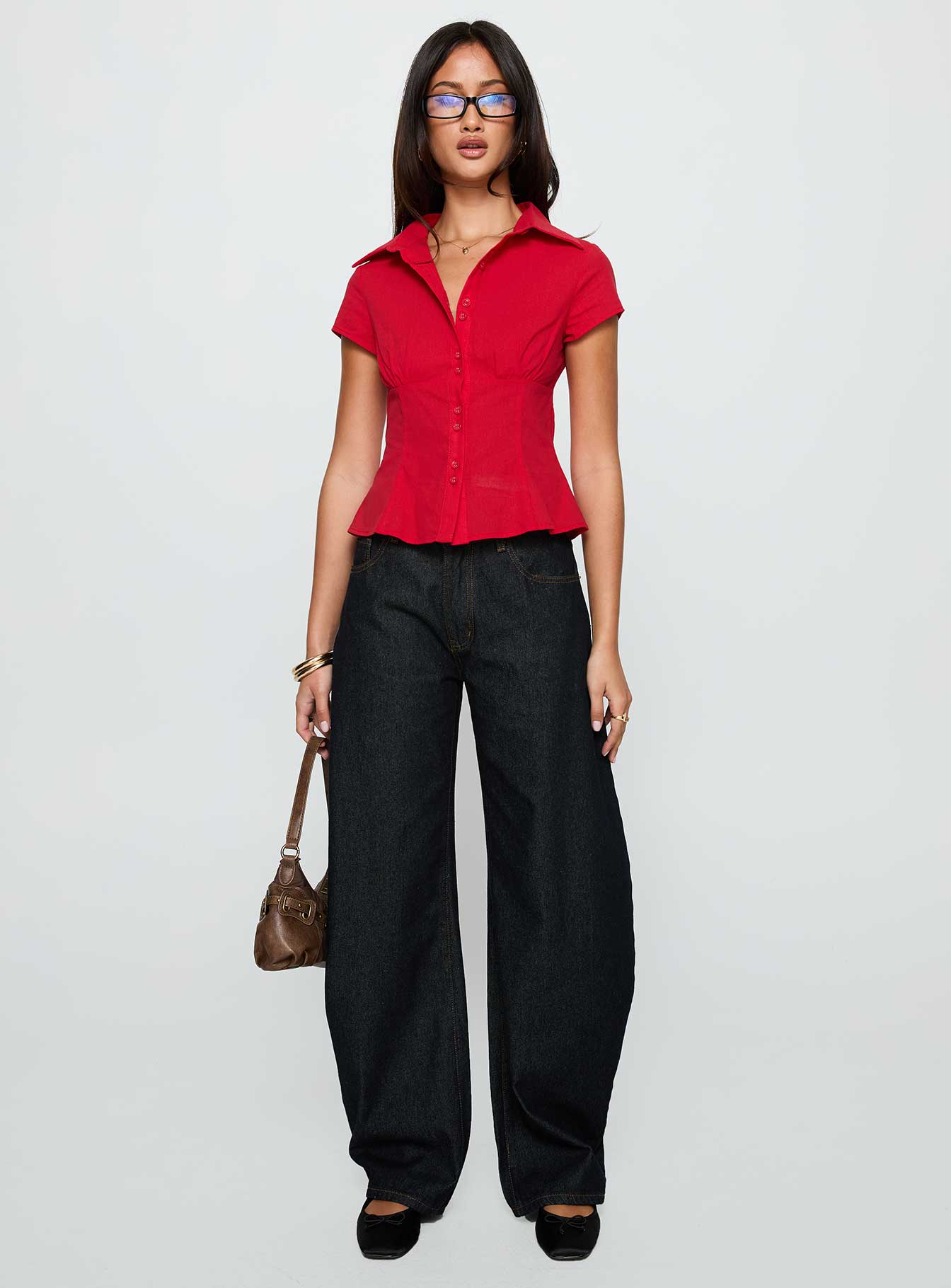 side view of model wearing Princess Polly Cottesloe Blouse Top Red Short Sleeves V-Neck 