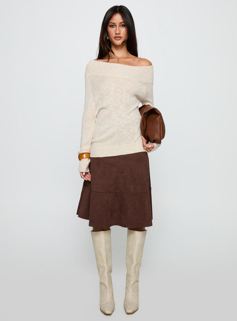 Showcasing the Alyxandra Off Shoulder Knit Sweater in Beige, a long womens jumper with oversized fit and boat neckline, front view of model wearing Princess Polly
