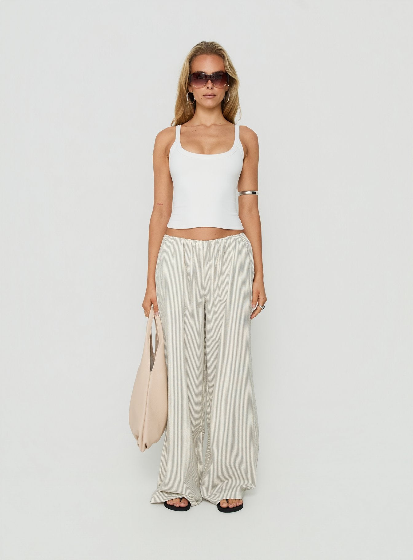 Explore the Lunea Concealed Waistband Pants Pinstripe in womens regular pants with mid-rise styling front view of model wearing Princess Polly