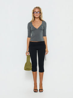 front view of model wearing Princess Polly Bailor Channel Waistband Capri Pants Black Mid Rise Pants 