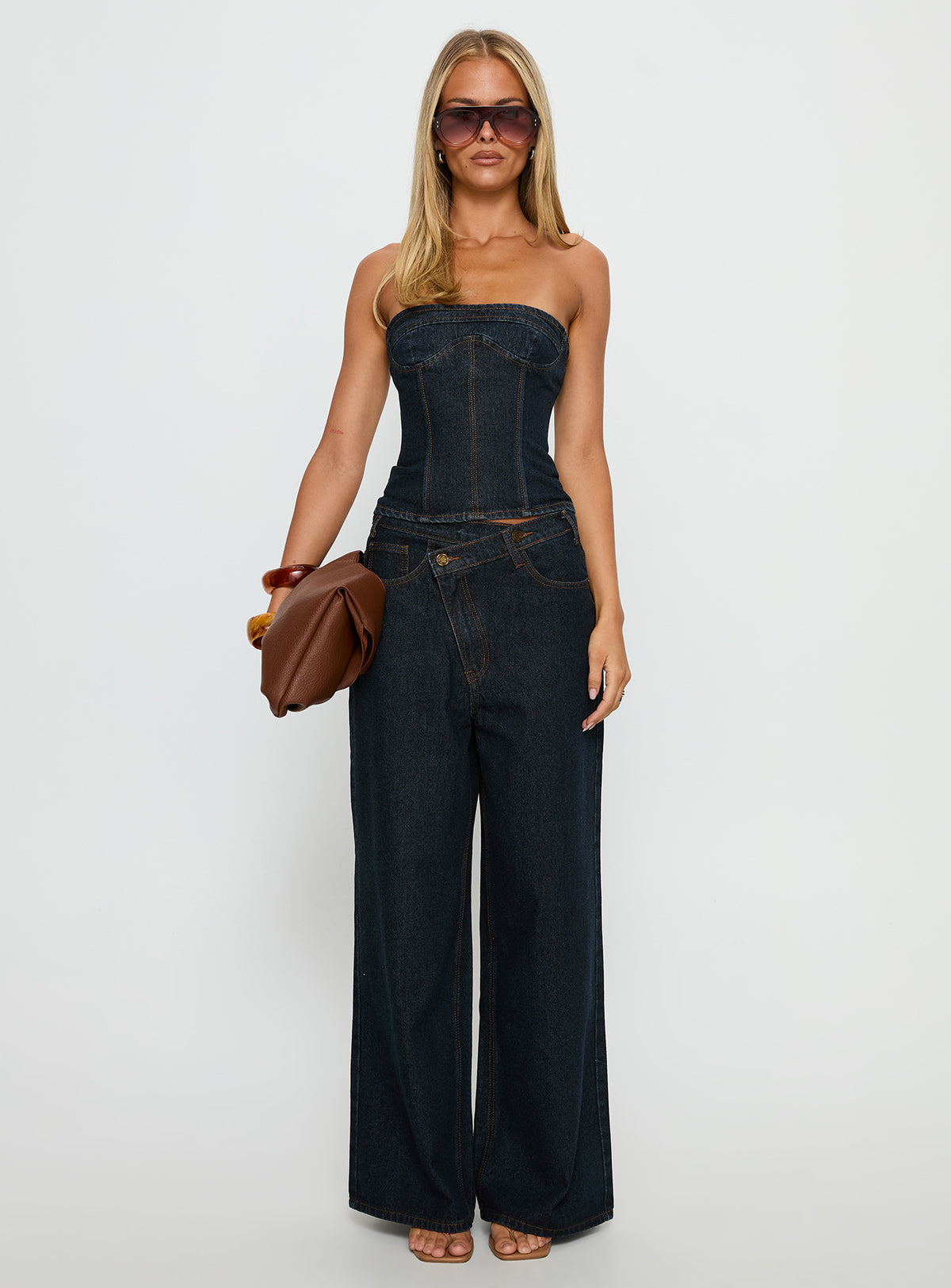 front view of model wearing Princess Polly Blue Crush Low Rise Wide Leg Jeans Indigo Mid Rise Jeans 