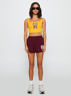 back view of model wearing Princess Polly ASU Jersey Corset Top Gold Sleeveless Square Neck 