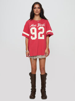 side view of model wearing Princess Polly New York 95 Oversized Tee Red Half Sleeves Crew Neck 