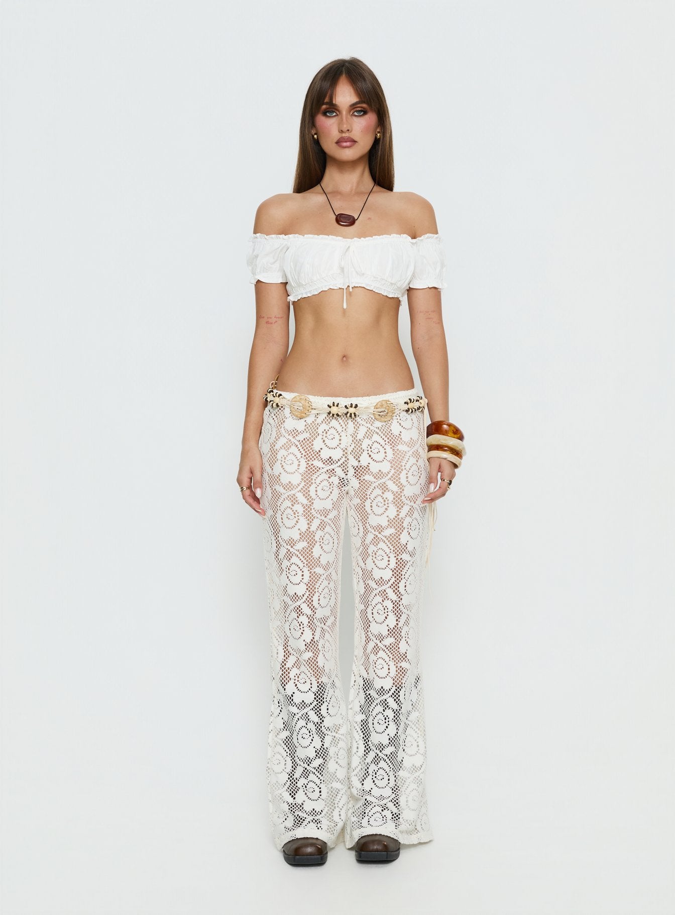 side view of model wearing Princess Polly Rosadonna Lace Flare Pants Cream Mid Rise Pants 