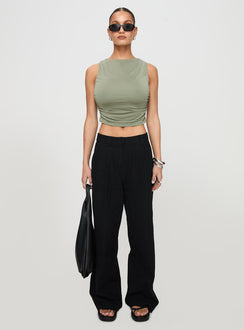 front view of model wearing Princess Polly Hold Em High Neck Top Green Sleeveless Crew Neck 