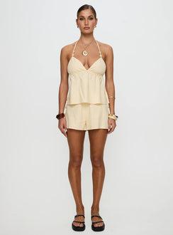front view of model wearing Princess Polly Solid Gold Top Lemon Sleeveless Plunger 