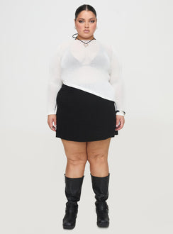 side view of model wearing Princess Polly Pratt Long Sleeve Top White Curve Full Sleeves High Neck 