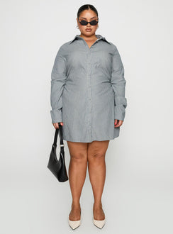 side view of model wearing Princess Polly Publicity Long Sleeve Mini Dress Blue Pinstripe Curve V-Neck 