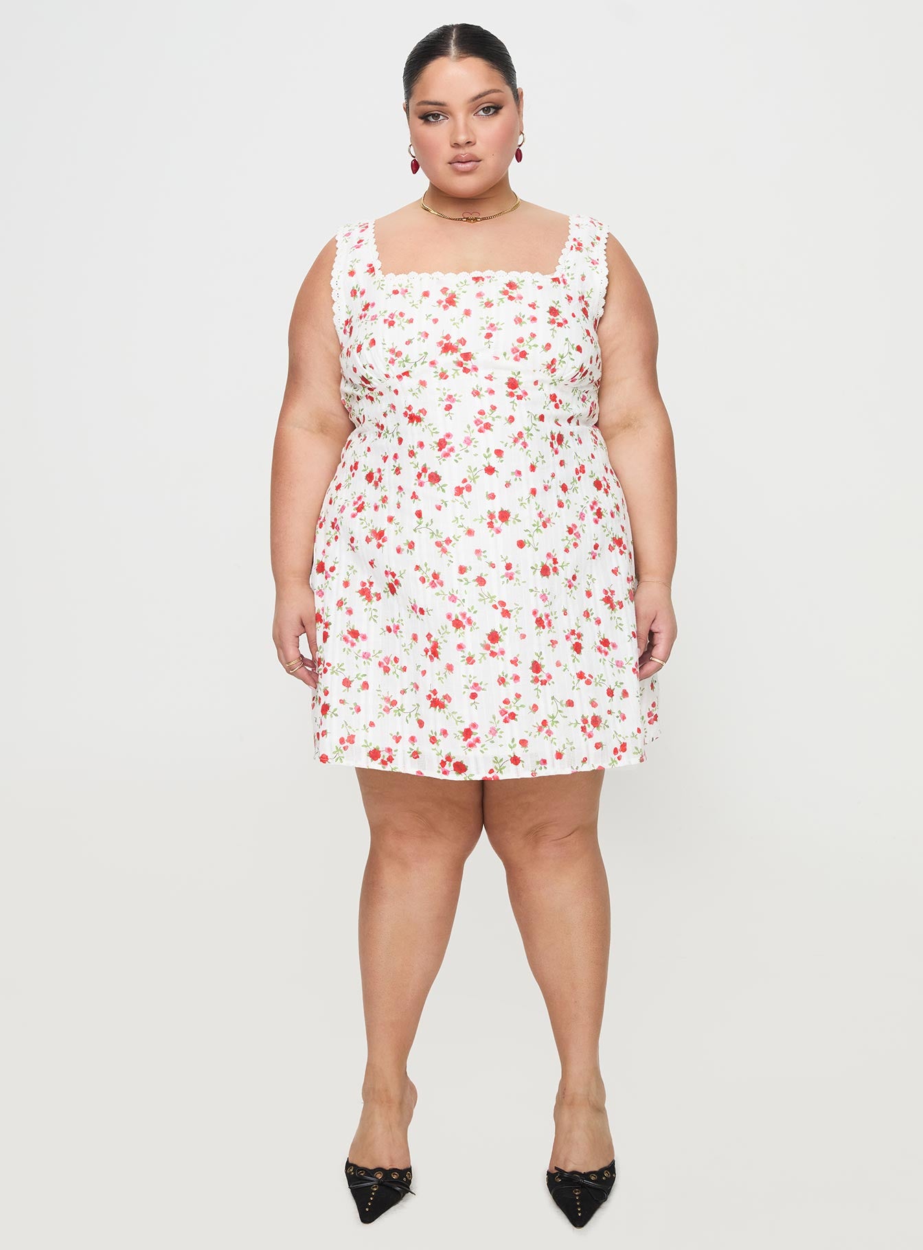 side view of model wearing Princess Polly Dasha Mini Dress White Floral Curve Square Neck 