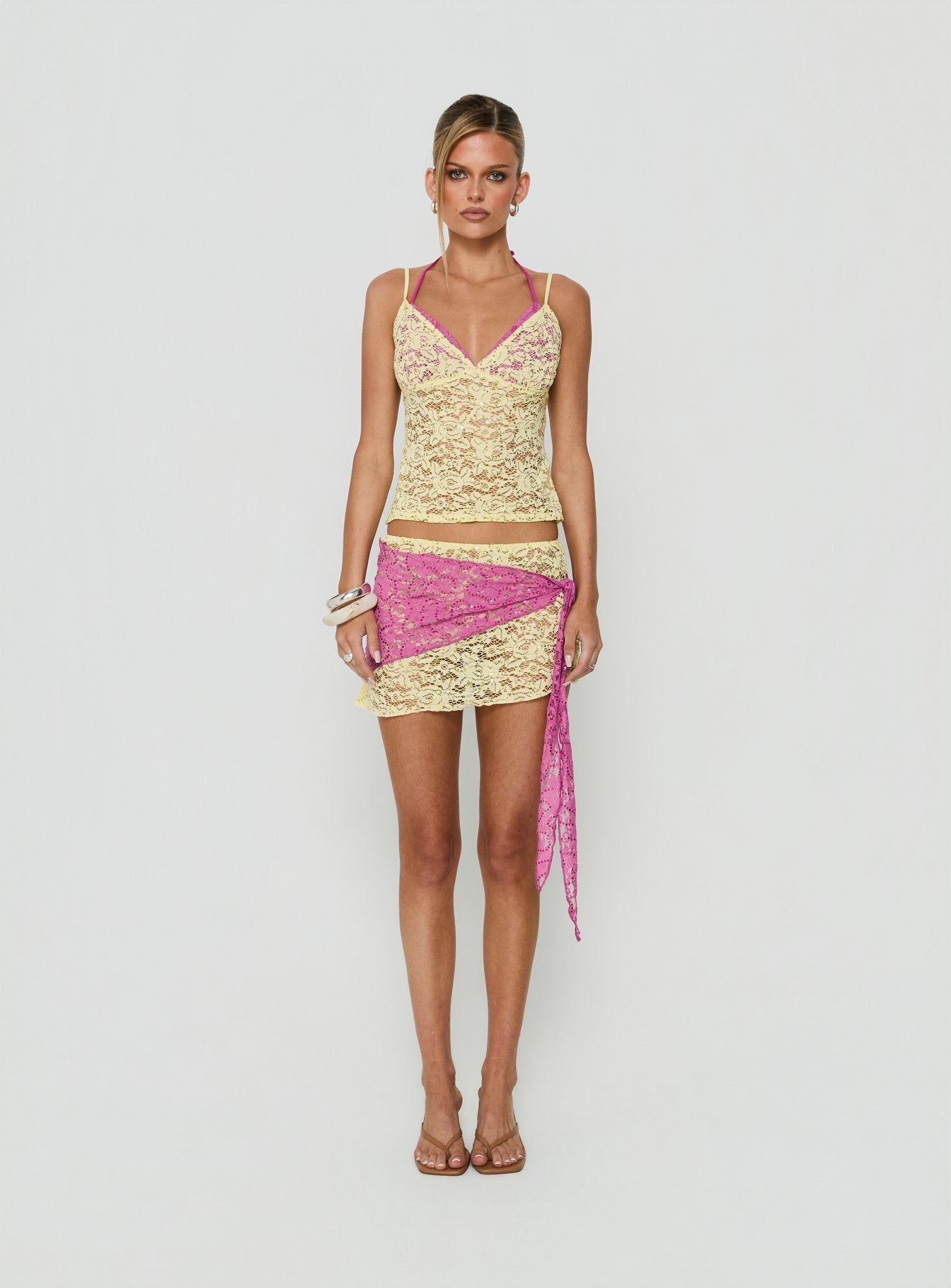 Featuring the Sirna Lace Wrap Contrast Mini Skirt Lime / Pink womens-skirts mini product Princess Polly