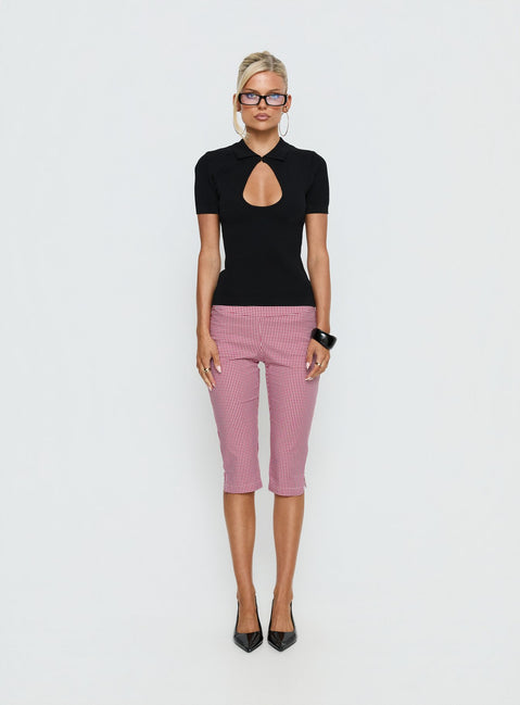 side view of model wearing Princess Polly Rossie Capri Pants Red Gingham Mid Rise Pants 