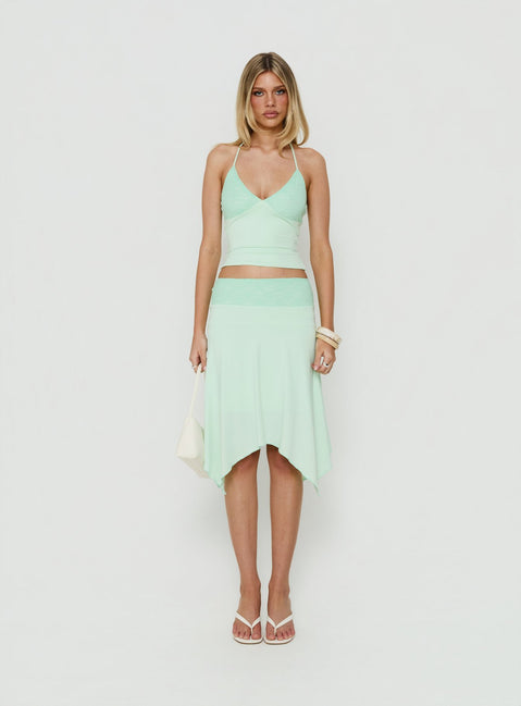 Showcasing the Natabelle Lace Detail Midi Skirt in Mint, a womens-skirts piece with asymmetry and fitted fit Princess Polly