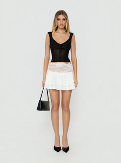 Showcasing the Kecia Lace Waistband Mini Skirt White in womens-skirts featuring mini length front view of model wearing Princess Polly