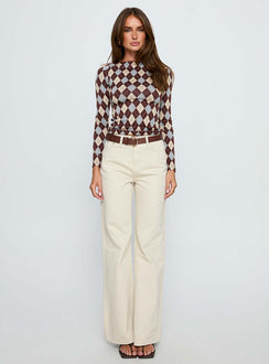front view of model wearing Princess Polly Maple Mid Rise Flare Jeans Ecru High Rise Jeans Jeans 