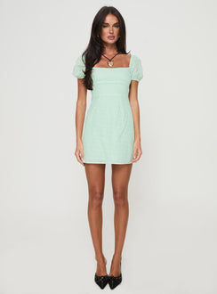 front view of model wearing Princess Polly Havena Anglaise Mini Dress Sage Square Neck 